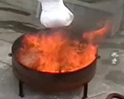 Dryfoam beads poured from a supersack onto a burning fuel pan spread across the surface and put the fire out